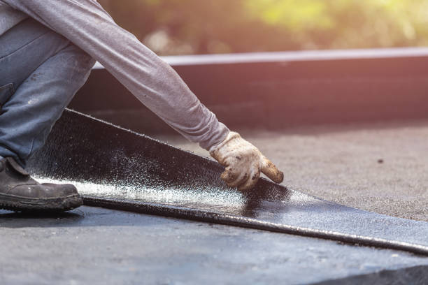 Professional Exterior Waterproofing technician working in Clare, MI